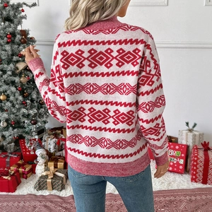 Women's festive red and white Fair Isle knit sweater shown from the back in a cozy room