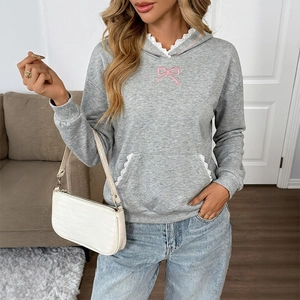 Gray long-sleeved hoodie with pink bow embroidery and white lace trim detail