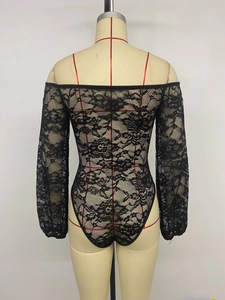 Close-up of elegant black lace bodysuit with fine floral patterns and back details