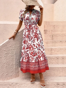 Detail of V-neckline with bohemian lace trim on a floral print long sleeve dress