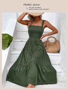 Detailed view of the dark green tiered smocked dress with spaghetti straps for summer