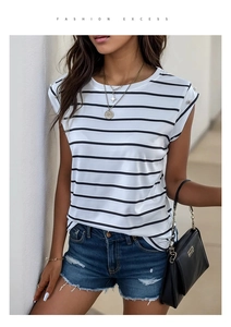 Detail of metal buttons on shoulders and striped pattern of a white sleeveless T-shirt