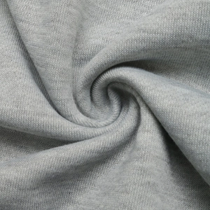 Close-up macro view of soft light grey knit fleece fabric texture with soft natural folds