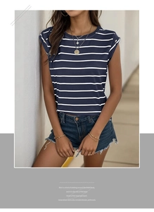 Close-up of sleeveless navy striped T-shirt featuring decorative shoulder buttons and round neck