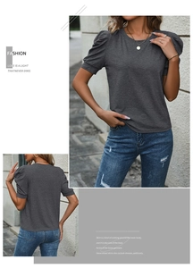 Detail of dark grey puff sleeve T-shirt with textured knit fabric and casual fit