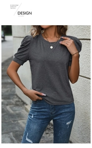 Close-up of stylish puff sleeves on a dark grey casual cotton blend t-shirt