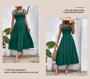 Detail of dark green tiered maxi dress with smocked bodice and spaghetti straps