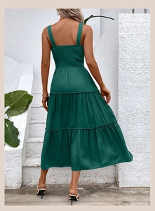 Detail view of forest green tiered maxi dress with smocked elastic back for summer