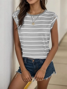 Detail of classic striped sleeveless T-shirt featuring decorative gold buttons on shoulder