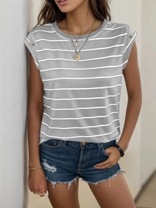 Close-up of women's grey striped t-shirt with rolled sleeves and gold button details