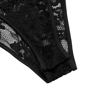 Detail view of black lace bodysuit featuring floral mesh fabric and secure snap buttons