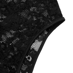 Detailed macro view of black floral lace texture and elastic binding on a slim bodysuit