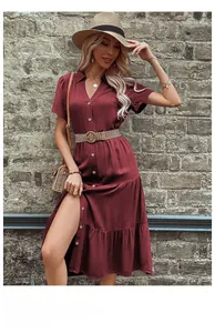 Detail of burgundy button-down shirt dress with V-neck and woven belt with wooden buckle