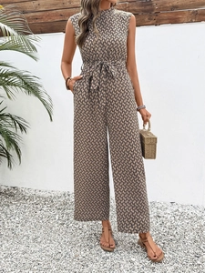 Detail showing high-waisted sleeveless jumpsuit with abstract geometric chain print