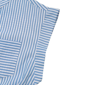 Detail of blue and white vertical stripes, cuffed short sleeve, and front pocket design