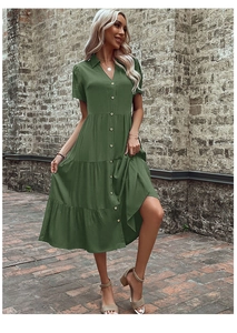 Close-up of a dark green short-sleeved shirt dress with tiered skirt and button-down front