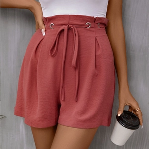 Women's high-waisted brick red paperbag shorts with adjustable drawstring and pleats