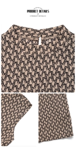 Detail view of sleeveless geometric print jumpsuit featuring round neck and waist tie belt