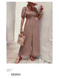 Detail of square neck and elastic smocked bodice on brown floral wide-leg jumpsuit