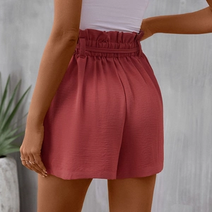 Women high waisted paperbag shorts in rust red color with a matching self-tie belt