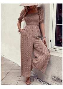 Floral print bohemian romper with puff sleeves and square neckline for summer vacation style