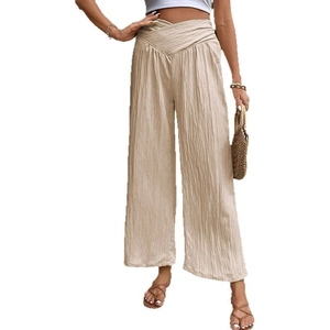 Women's pleated high waist wide leg trousers in beige with a stylish cross-over V-waistband