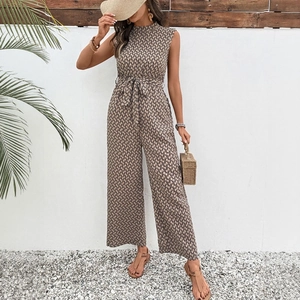 Summer sleeveless jumpsuit with geometric print, belted waist and wide leg silhouette