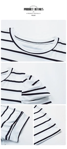 Detail von Rundhalsausschnitt und feinen Nähten am klassisch schwarz-weiß gestreiften T-Shirt