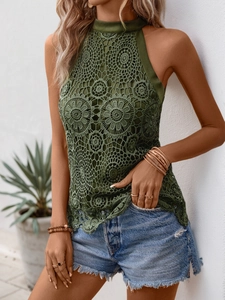 Detail of army green lace halter top featuring floral cutout design and slim fit style