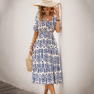 Women's summer V-neck A-line dress with vintage blue and white print and ruffled hem