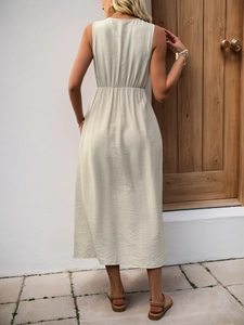 Back view of a sleeveless V-neck midi dress with elastic high waist in light sage green