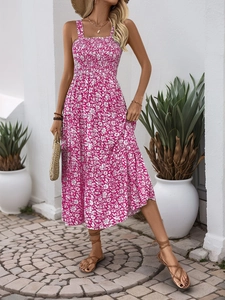 Detail of smocked bodice and square neck on rose red floral print summer dress