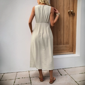 Back view of apricot sleeveless V-neck midi dress with elastic waist and crinkled texture