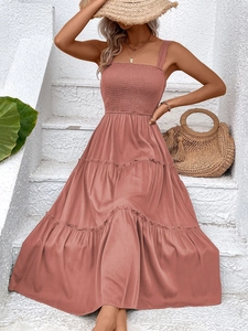 Detail of tiered sleeveless maxi dress with smocked bodice and wide shoulder straps