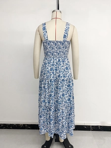 Detail view of the blue floral maxi dress featuring elastic smocked back and tiered skirt