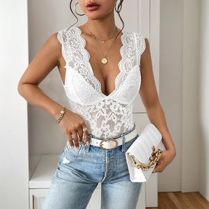 Detail of white floral lace sleeveless bodysuit with deep V-neckline and sheer texture