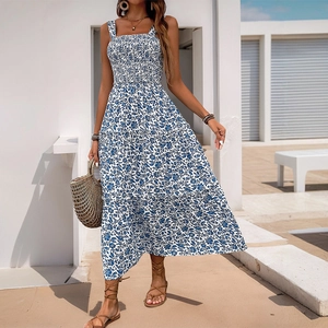 Summer sleeveless floral maxi dress with smocked bodice and tiered hem on blue white print