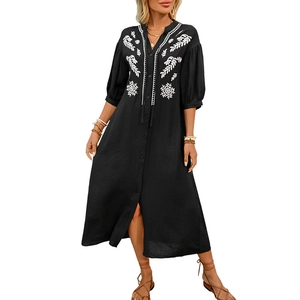 Ethnic style black V-neck maxi dress with white floral embroidery and puff sleeves