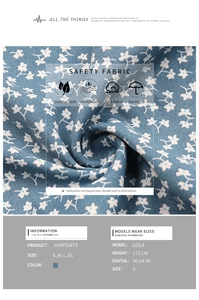 Detail of blue floral print jumpsuit fabric showing soft texture and breathable material