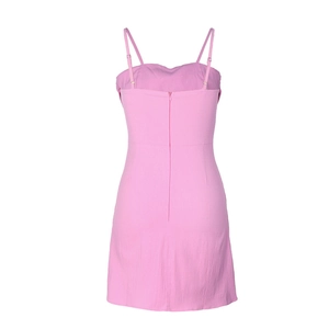 Detail view showing back invisible zipper and adjustable straps of pink mini dress