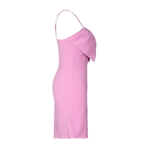 Side view detail of pink backless mini dress featuring ruffle textures and slim straps
