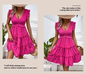 Detail of vibrant rose pink V-neck tiered dress with ruffle sleeves and pleated texture