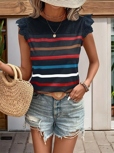 Detail of navy striped top showing delicate blue eyelet lace ruffles on the short sleeves