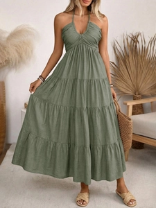 Sage green halter neck tiered maxi dress with backless design for resort vacations