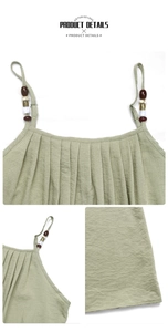 Detail of light green sundress featuring beaded straps and elegant pleated neckline texture