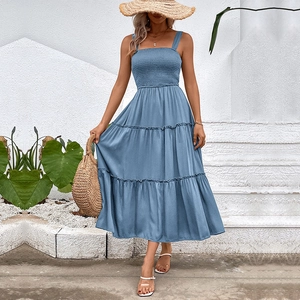 Blue smocked tiered midi dress with square neck and wide straps for summer vacations
