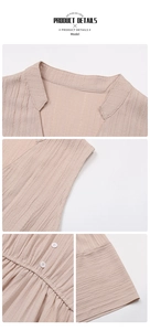 Detailed view of the V-neckline and textured pleated fabric of the sleeveless summer dress