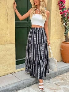 Detail view of high waist summer maxi skirt with ethnic geometric patterns in black and white