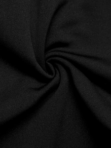 Close-up of high-quality black knitted fabric texture for a summer sleeveless dress