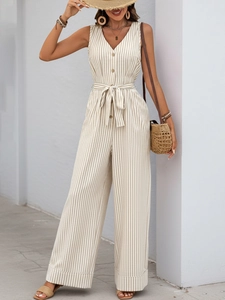 Detailed view of striped sleeveless jumpsuit with V-neck, wooden buttons and waist tie